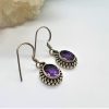 Ametüst hõbepitsiga kõrvarõngad